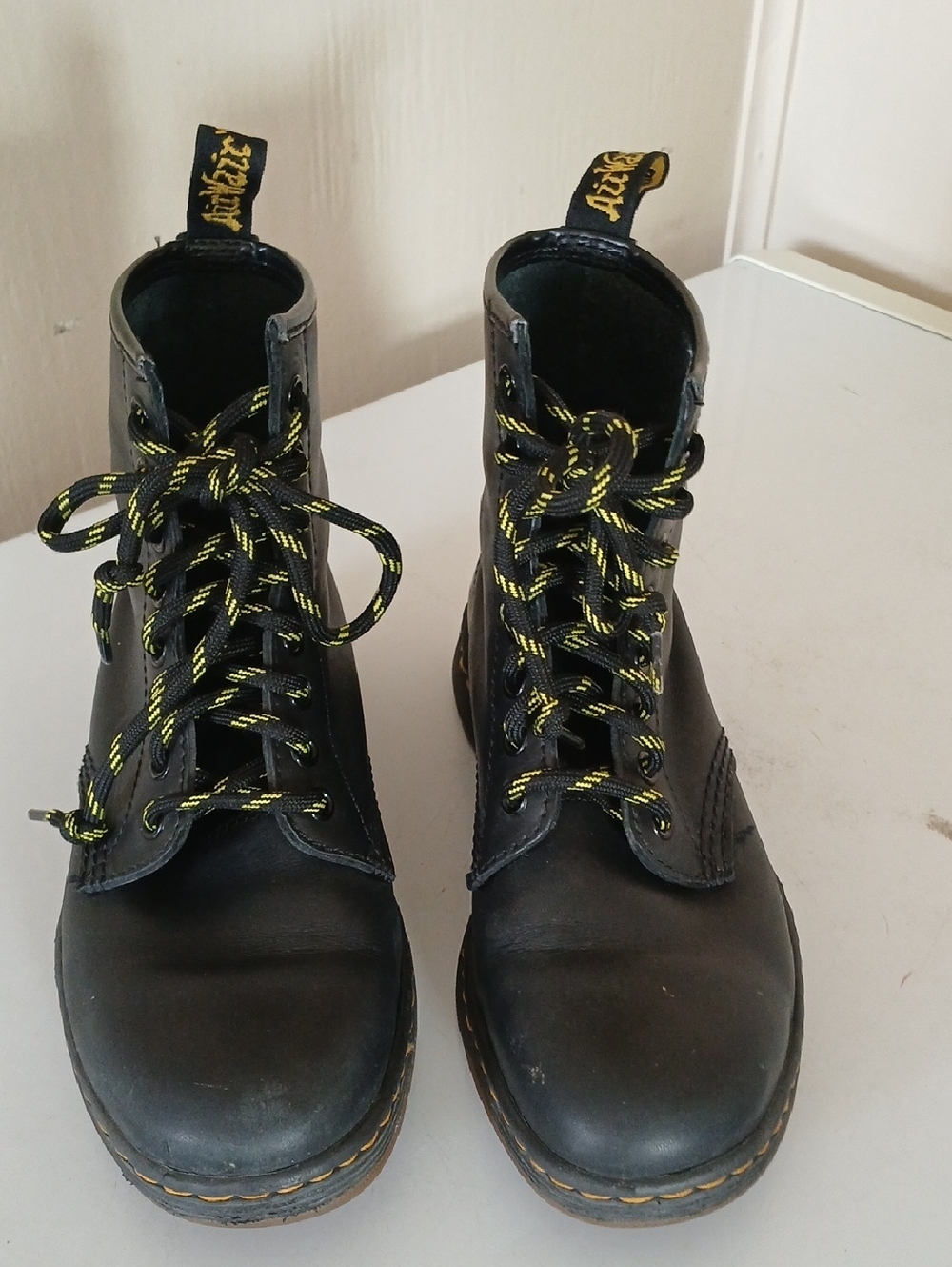Dr. Martens Black Leather Lace-Up Boots with Yellow Accents